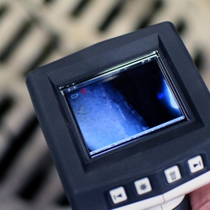 Detail van inspectie van riolering met camera